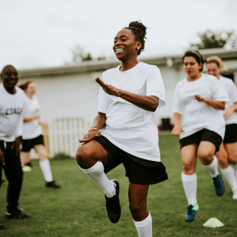 Adults taking part in an inclusive coaching session, promoting accessible grassroots sport, confidence and participation.